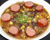 Foto del paso 6 de la receta: Sopa de porotos negros con zapallo y salchichón kielbasa