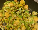 A picture of step 4 of Chilli Spouts and pinenuts.