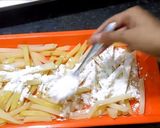 A picture of step 3 of Garlic fries.