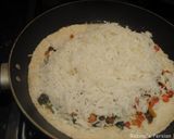 A picture of step 7 of Persian Pomegranate Rice with Pistachio and Raisins.