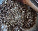 A picture of step 4 of Fried Omena(dagaa).