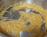 Foto del paso 1 de la receta: Fideos con alcachofas, brócoli y langostinos