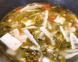 Hình bước làm 3 của món Canh măng trúc lá giang chua cay
