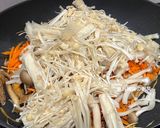 A picture of step 12 of Stir-Fried Tofu Skin with Oyster Sauce and Two Mushrooms.