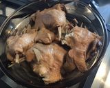 A picture of step 2 of Oven-Baked Duck Confit with Roasted Garlic, Onion, and Parsley.