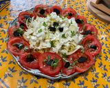 A picture of step 11 of Endive Salad with Tomatoes, Black Garlic, and Feta.