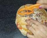 A picture of step 10 of Sandwich pizza from leftover Roti.