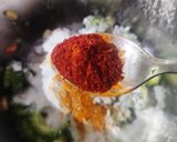 A picture of step 2 of Besan Karela Fry.