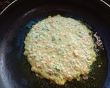A picture of step 2 of Veggie Oats Chilla with green chutney.