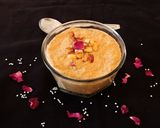 A picture of step 6 of Caramel Payasam in pressure cooker.