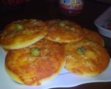 صورة لخطوة 3 من وصفة ميني بيتزا