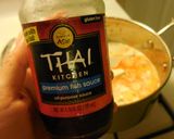 A picture of step 8 of Thai Red Curry with Chicken & Tofu.