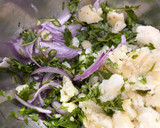 A picture of step 1 of Aloo pitika.