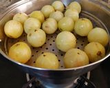 A picture of step 1 of Amla Chunda With Jarggery.