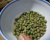 A picture of step 2 of Mashed potates and peas.
