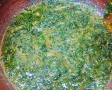 A picture of step 5 of Alu palak.
