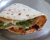 A picture of step 7 of Chicken tortilla wrap.