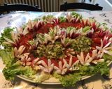 Une image de l'étape 12 de Salade de tomates,scarole,céleri et thon aux radis « fleurs ».