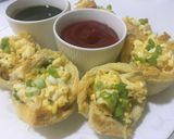 A picture of step 9 of Egg-cheese salad in bread cups.