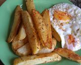 Foto del paso 4 de la receta Patatas oreganadas con huevos a la plancha