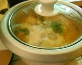 A picture of step 4 of Spicy, cheesy Tomato, mushroom noodle soup.