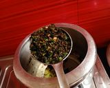 A picture of step 1 of (methi aloo) fenugreek leaves with potato in tomato gravy).