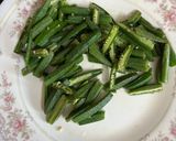 A picture of step 1 of Aachari Bhindi / Okra.