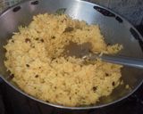 A picture of step 6 of Lemon rice and prawn curry.