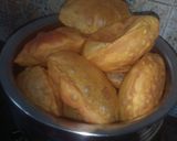 A picture of step 16 of Gujrati masala puri with aloo sabji.
