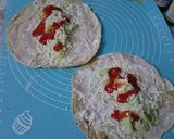 A picture of step 6 of Chicken Achari Wraps.