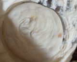 A picture of step 3 of Asli ghee or gurr ka paratha.
