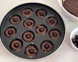A picture of step 10 of Healthy Atta Jaggery Muffins in Appe Pan.