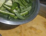 A picture of step 4 of Coconut fish curry.