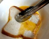 A picture of step 2 of My Eggy Bread with a little Grated Cheese, Quick and Easy too 😘.