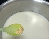 A picture of step 2 of Adrak tea.