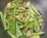 A picture of step 2 of Bari Potala Santula (Snake Gourd).