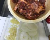 A picture of step 1 of Onion Lamb with Potatoes.