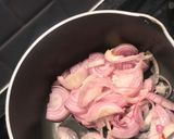 A picture of step 1 of Fried shallot and coriander rice.