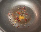 A picture of step 4 of Szechwan cola chicken.