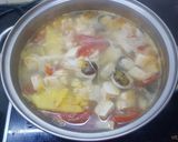 Hình bước làm 2 của món Canh chua nấu nấm