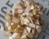 A picture of step 2 of Apple and pear chicken tikka stir fry with rice.