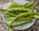 A picture of step 1 of Paella with Fresh Fava Beans and Pods.