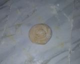 A picture of step 2 of Naan bread and chicken curry.