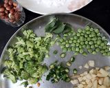 A picture of step 3 of Sabudana Vegetable Khichdi With Cucumber Pomegranate Raita.