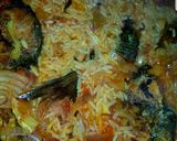 A picture of step 6 of Palm oil jollof rice.