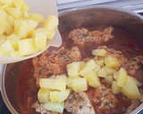 Foto del paso 9 de la receta: Contramuslos de pollo con patatas en salsa de whisky