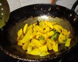 A picture of step 3 of Jeera aloo matar fry without onion garlic.
