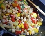 A picture of step 4 of Freshly picked courgette and chickpea curry.