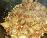 Foto del paso 4 de la receta: Arroz con chuleta de cerdo y maíz tierno