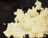 A picture of step 3 of Orange sondesh.